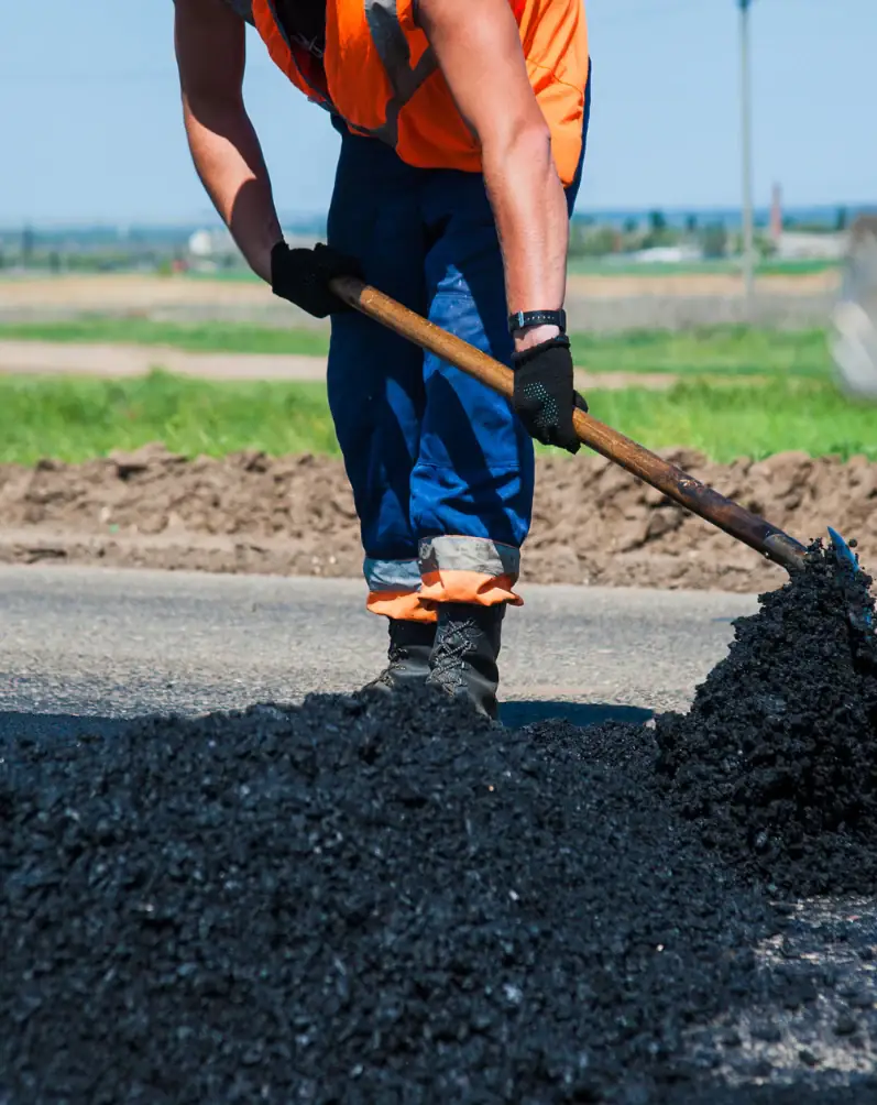 Asphalt Express LLC team at work on a Michigan driveway