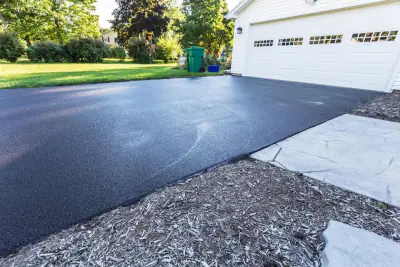 Asphalt Express crew laying hot mix asphalt