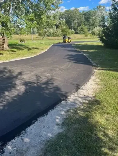 Driveway with a compacted gravel shoulder