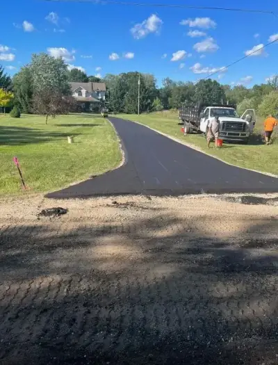 Roadside paving with the crew and truck