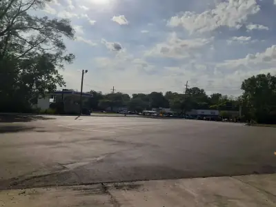 Worn parking lot ready for resurfacing