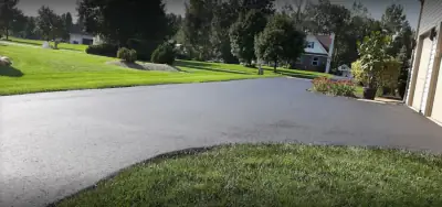 Driveway sweeping toward the house