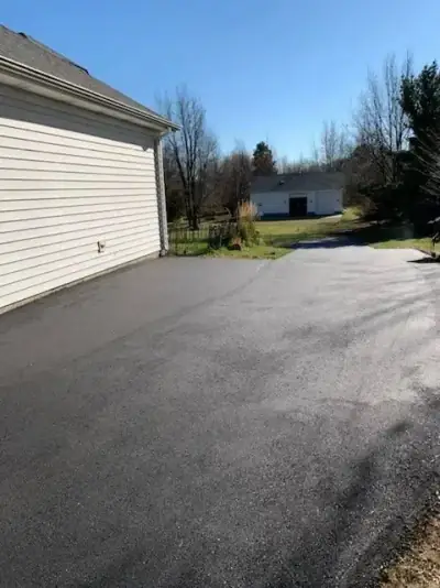 Driveway alongside an attached garage